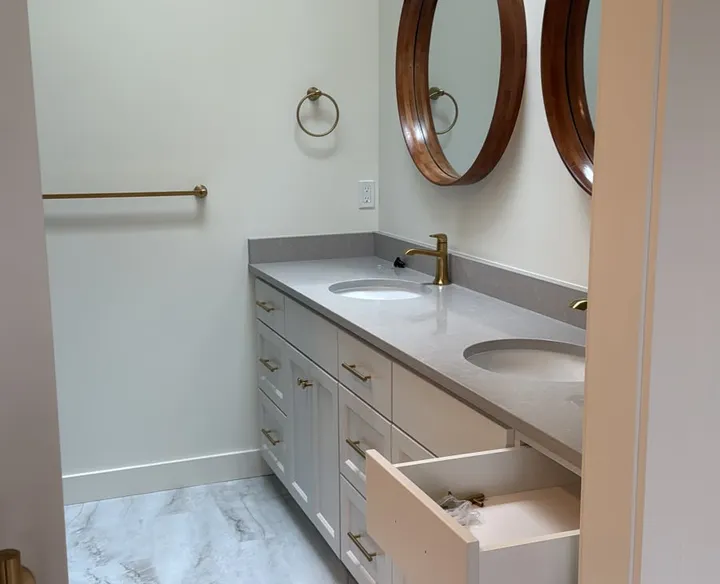 Bathroom vanity with soft white painted walls